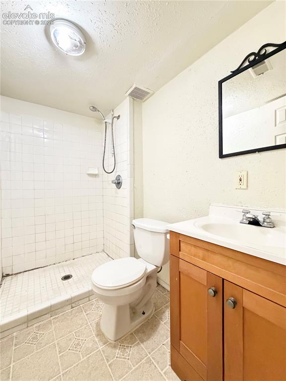 Image 11 of 16: Basement Bathroom