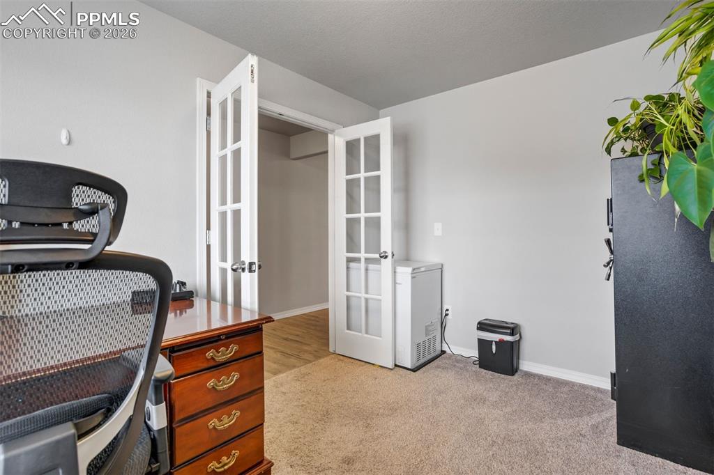 Image 12 of 45: Main level office where your future promotion delivers. 