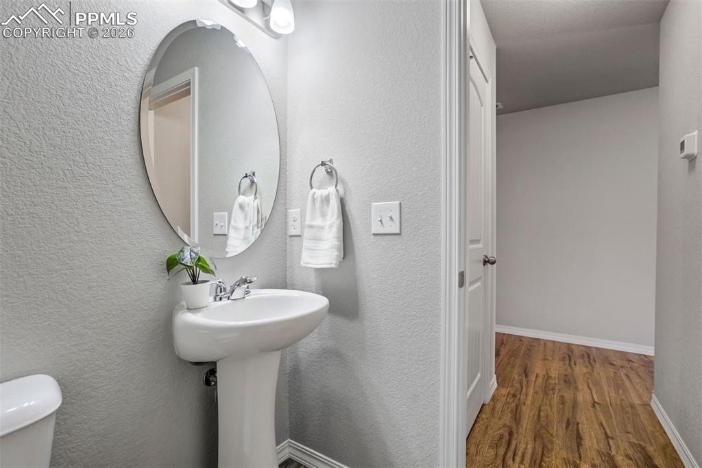 Image 15 of 45: Powder bathroom on the main level. 