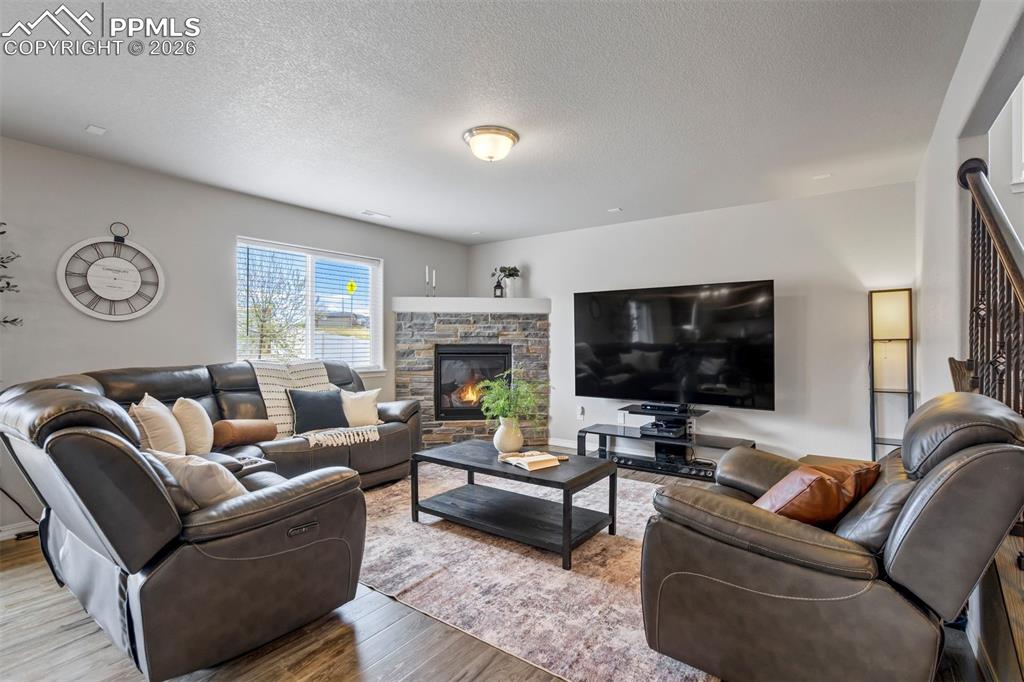 Image 4 of 45: This fireplace isn’t just a feature… it’s the main character all winter lon