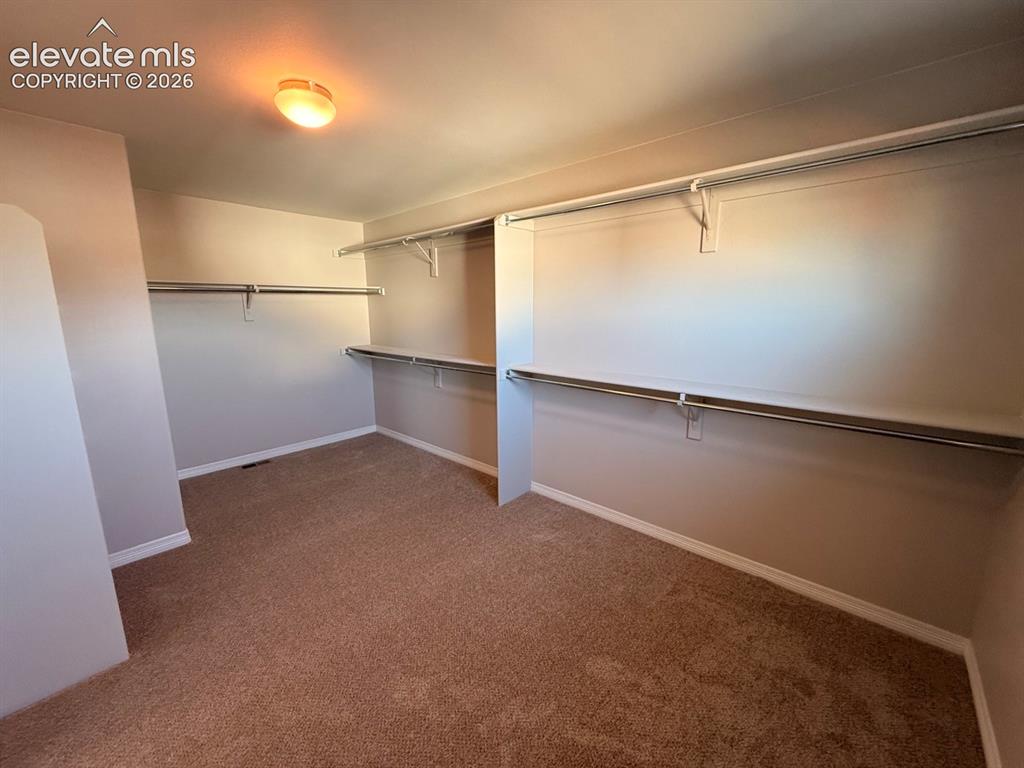 Image 36 of 50: Walk-In Closets