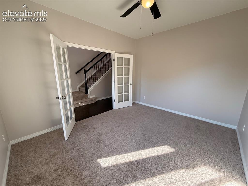 Image 7 of 50: Plush carpet flooring, neutral paint, and a ceiling fan with integrated lig