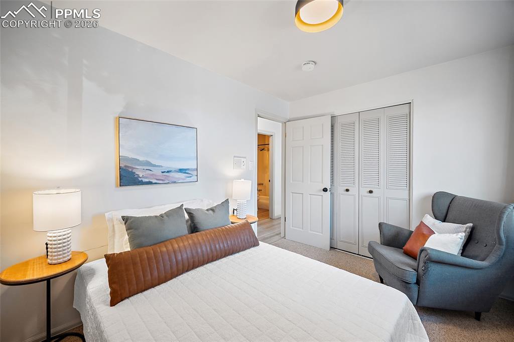 Image 24 of 45: Primary bathroom with vanity and a stall shower