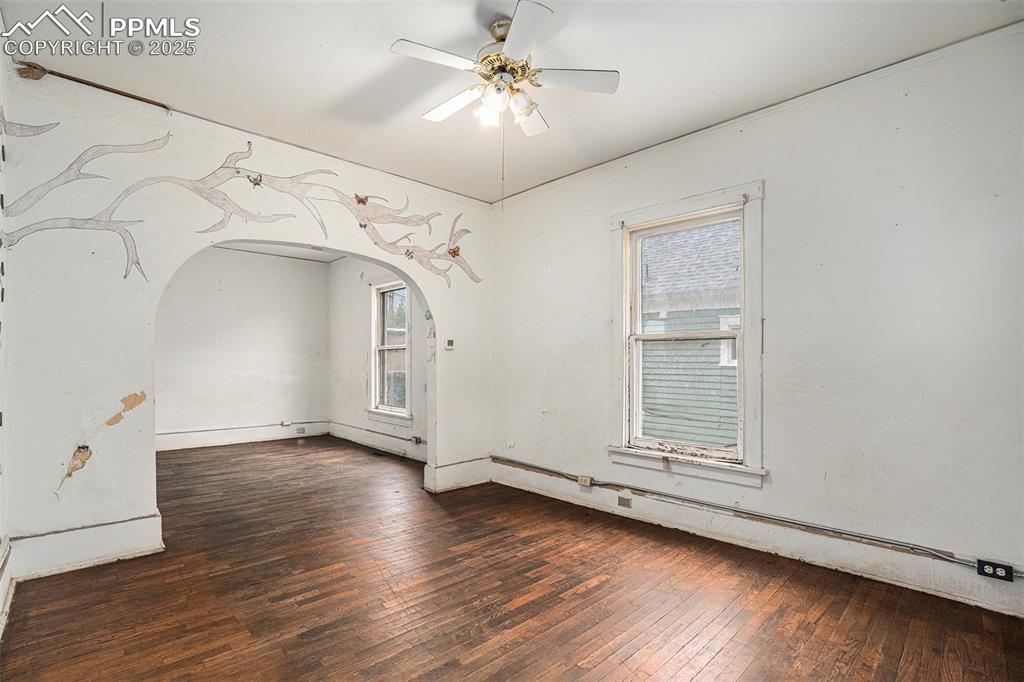 Image 2 of 12: Living room with hardwood floors
