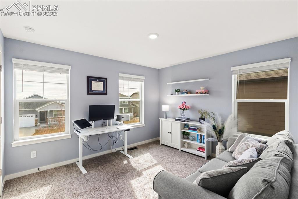 Image 19 of 43: Upstairs bedroom being used as an office