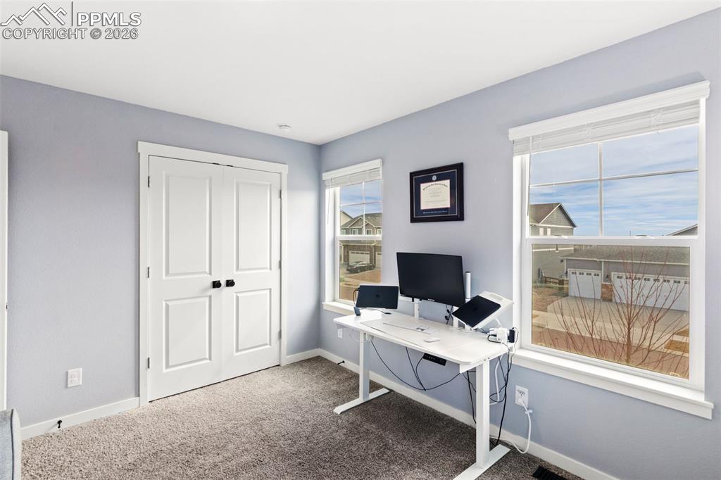 Image 21 of 43: Upstairs bedroom being used as an office