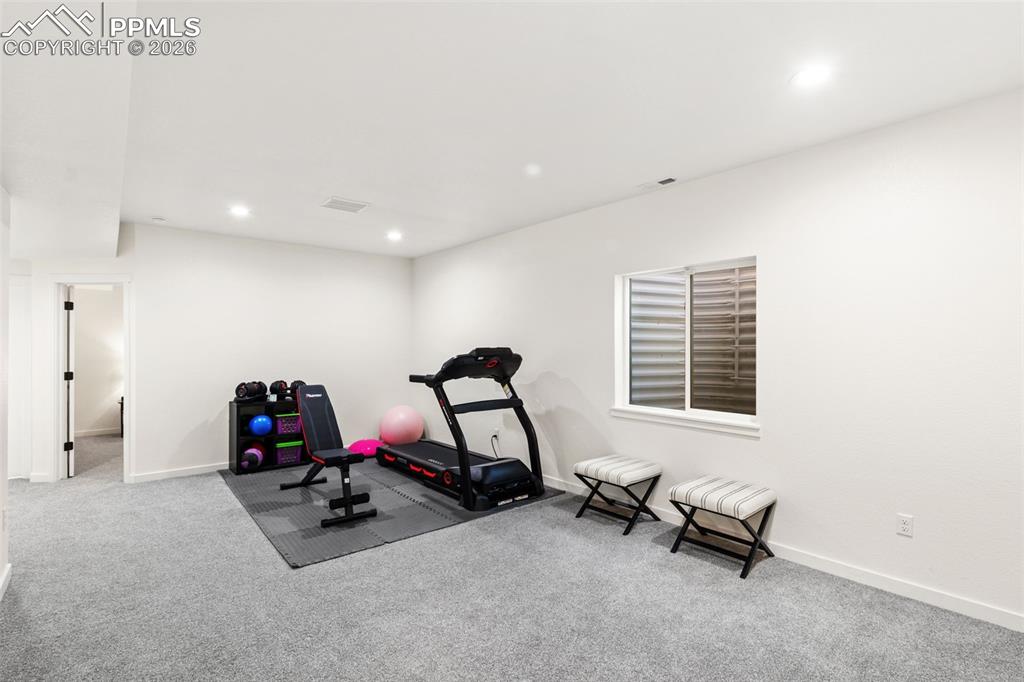 Image 28 of 43: Finished basement family room