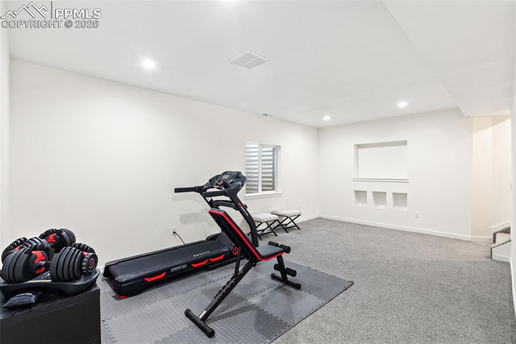 Image 29 of 43: Finished basement family room