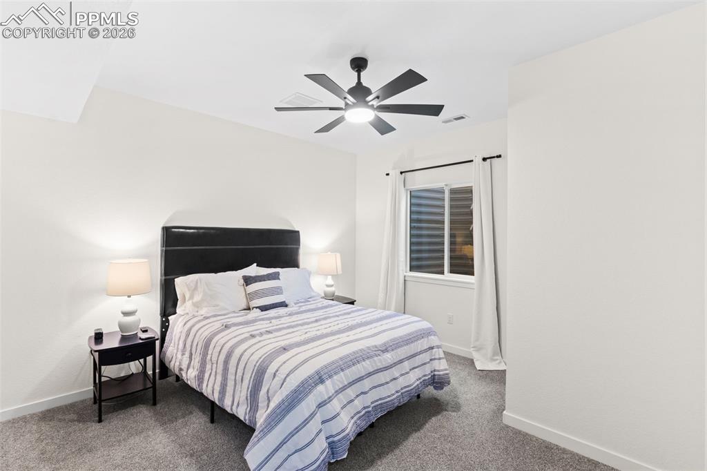 Image 30 of 43: Basement bedroom