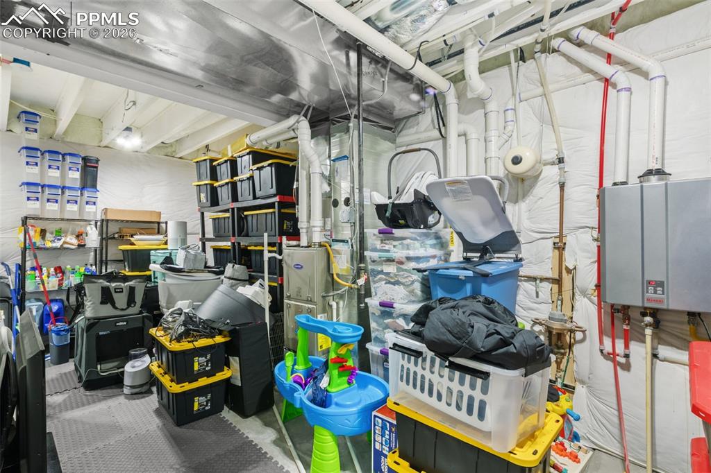 Image 33 of 43: large storage space in the basement