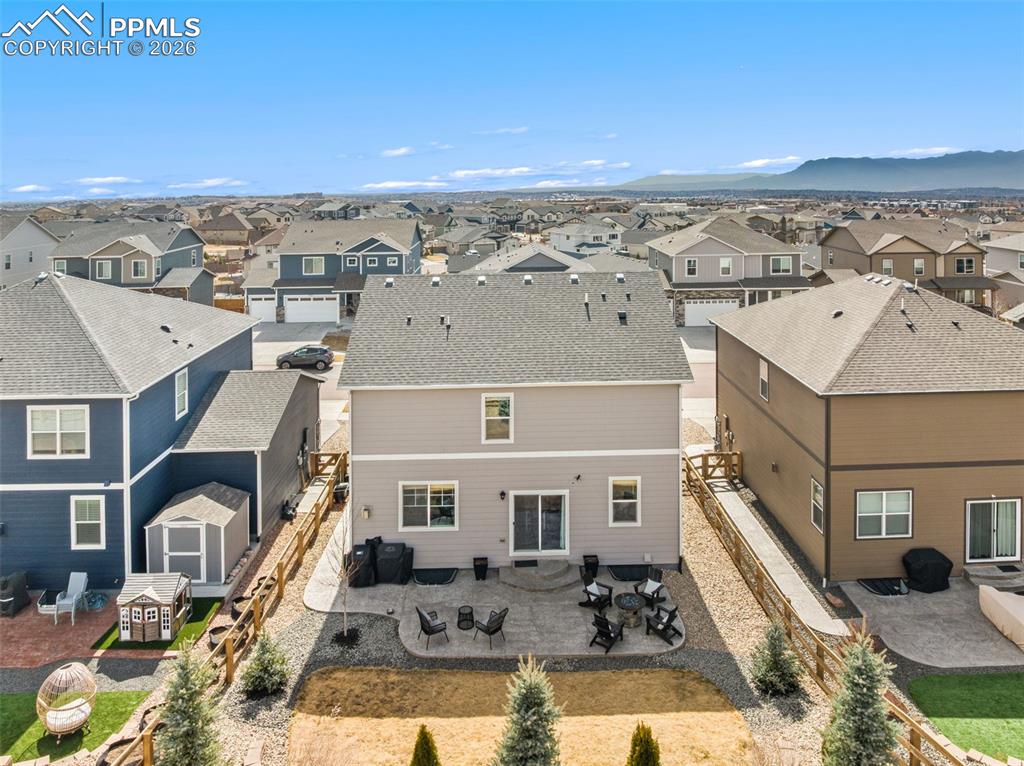 Image 36 of 43: Custom landscaping and large stamped concrete patio