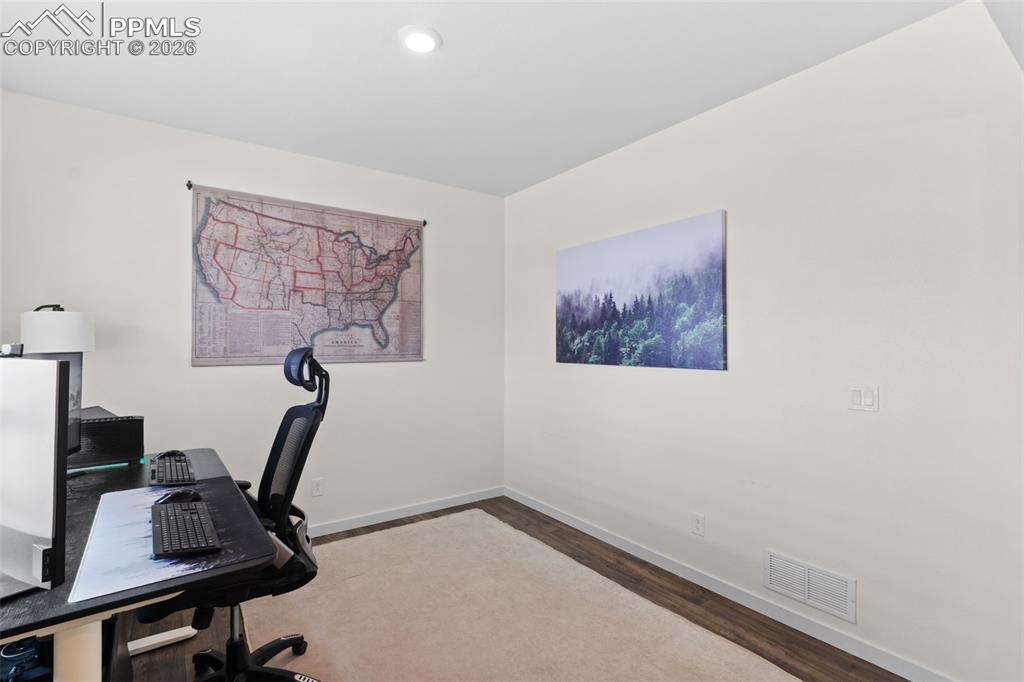 Image 5 of 43: Main level office of flex room