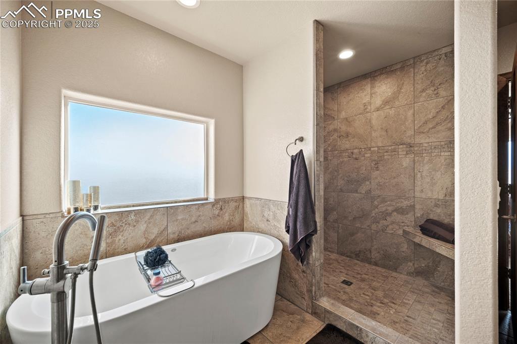 Image 20 of 49: a soaking tub and a large shower