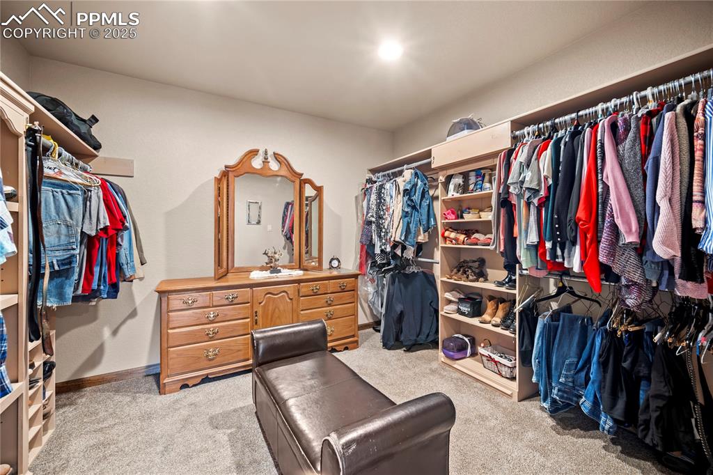 Image 21 of 49: a walk-in closet that will exceed your expectations
