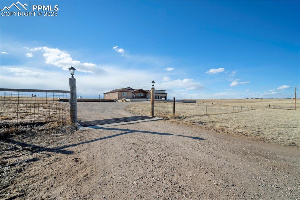 Image 4 of 49: Fully fenced with a cattle guard to keep out your animal pals