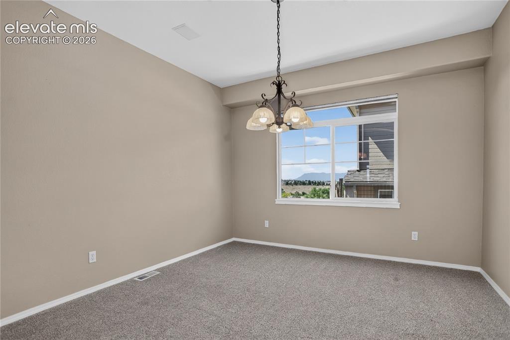 Image 14 of 45: Separate dining with in ceiling speakers