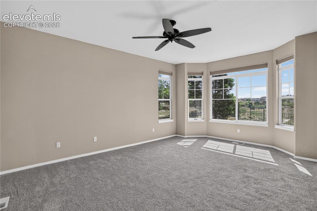 Image 19 of 45: Primary suite has a gorgeous bay window
