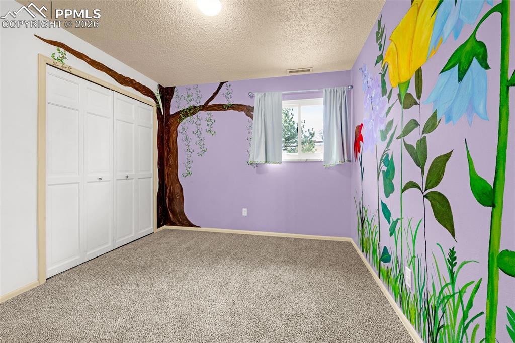 Image 12 of 20: Bedroom