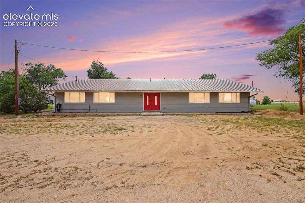 Image 3 of 45: Beautiful ranch-style home with a welcoming front entry with an  abundance 