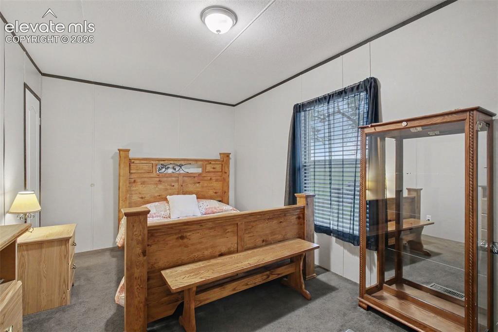 Image 36 of 45: 2nd Home: Comfortable and inviting secondary bedroom offering a peaceful sp