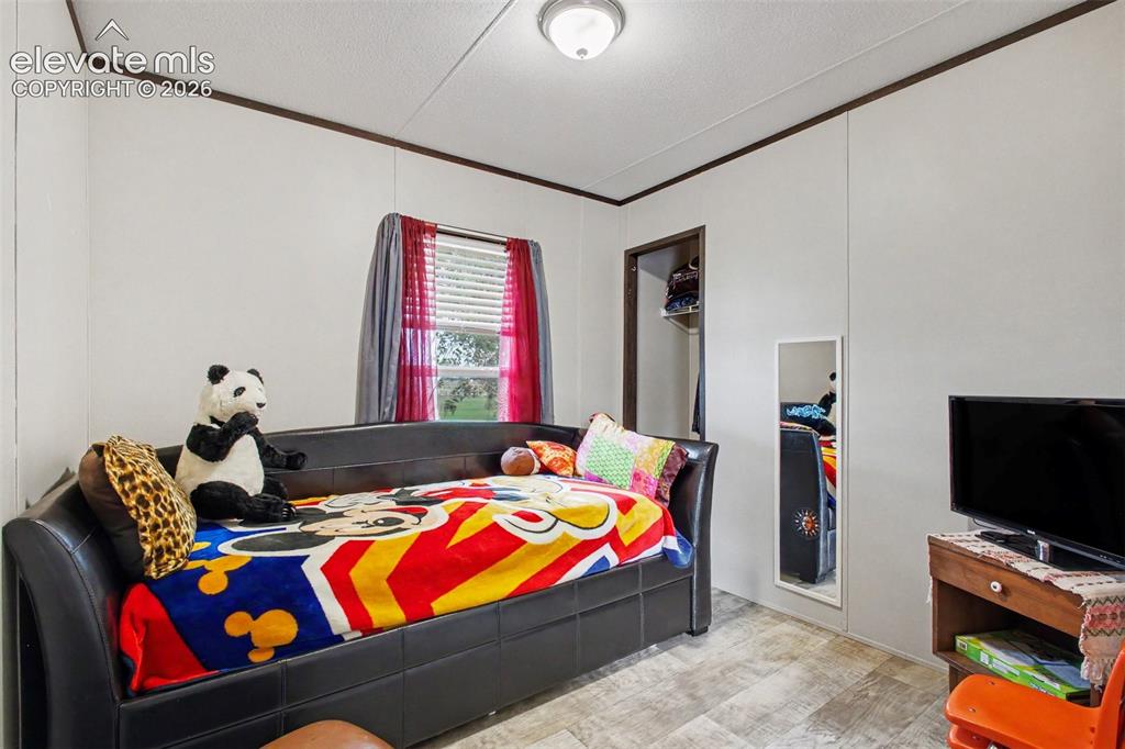 Image 37 of 45: 2nd Home: Welcoming third bedroom with a comfortable layout and plenty of f