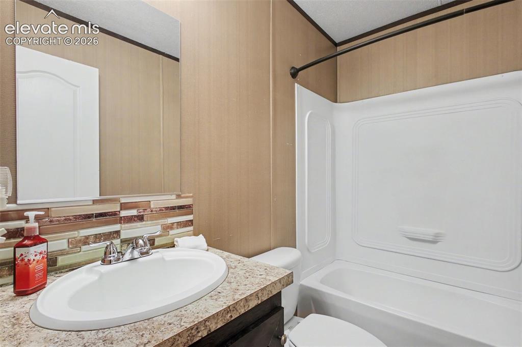 Image 38 of 45: 2nd Home: Clean and functional bathroom offering convenience for family and