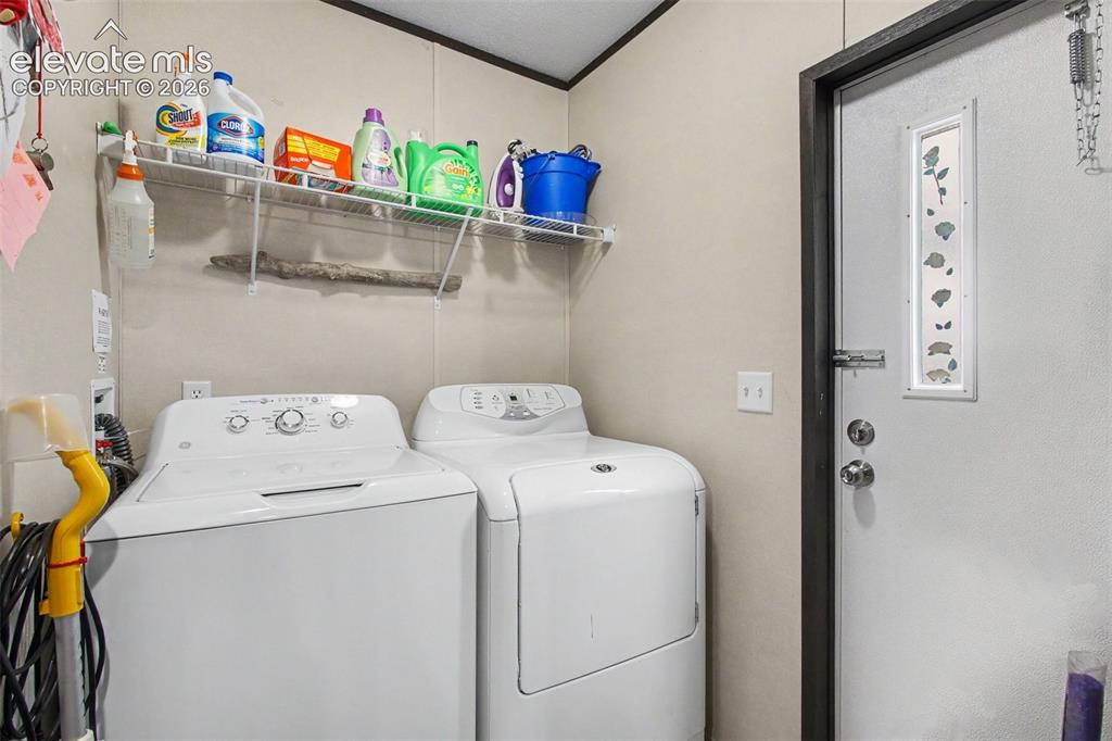 Image 39 of 45: 2nd Home: Convenient laundry room with a walkout.