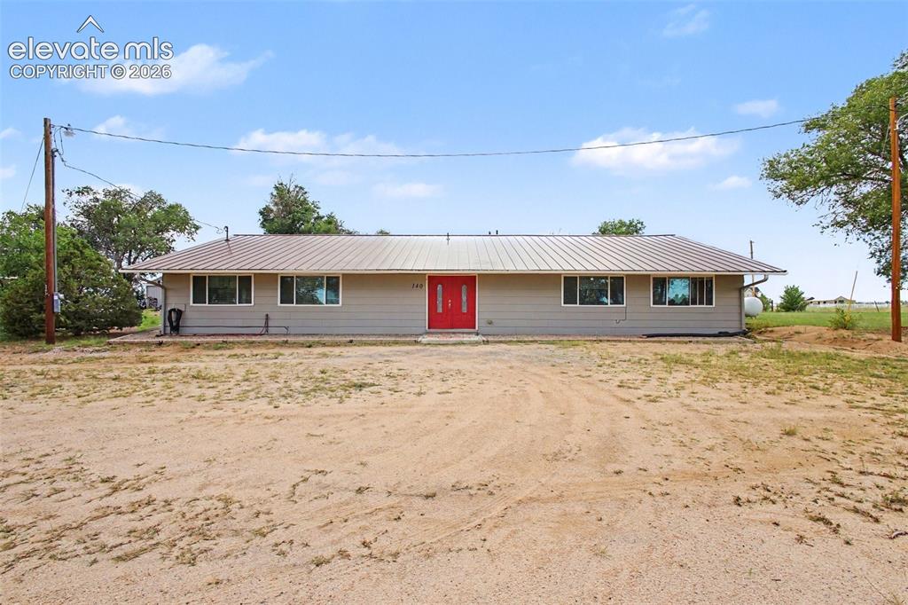 Image 4 of 45: The spacious property and expansive grounds provide plenty of room for vehi