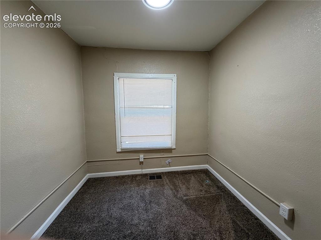 Image 13 of 36: Front unit Non-conforming bedroom