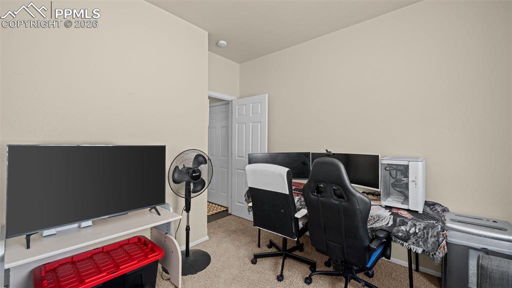 Image 24 of 37: Rec room with baseboards and carpet floors