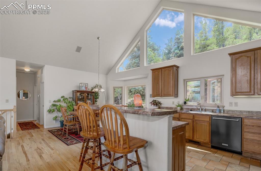 Image 11 of 46: Additional view of the kitchen and dining area