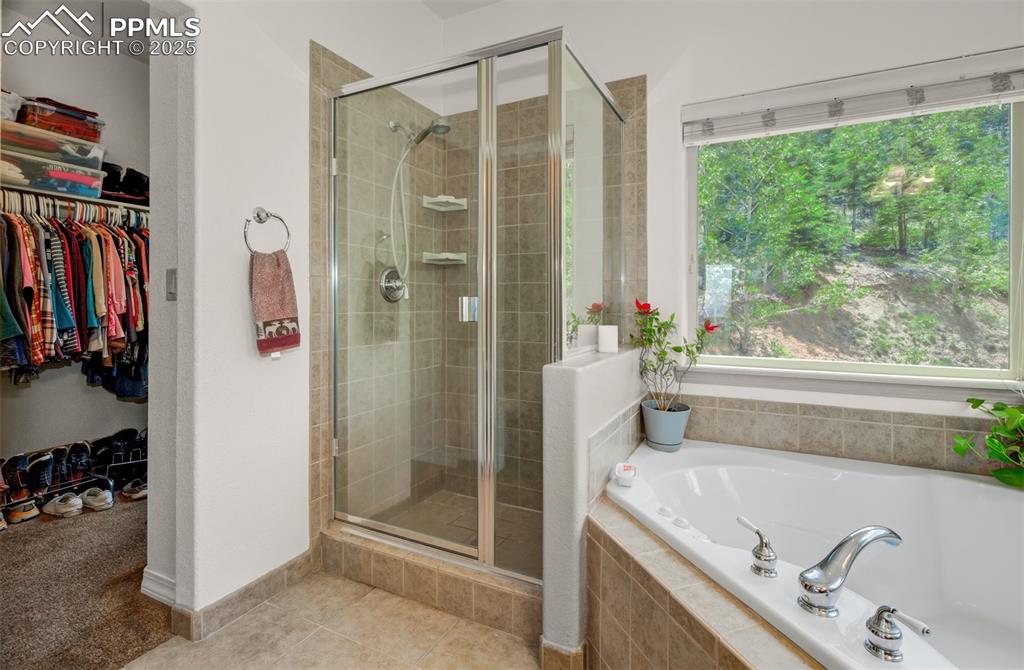 Image 21 of 46: Additional view of the Primary bathroom with a view into the spacious walk 