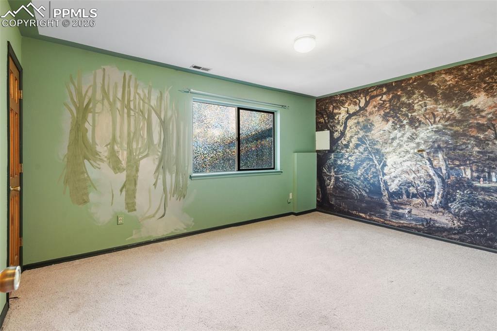 Image 20 of 32: Basement Bedroom