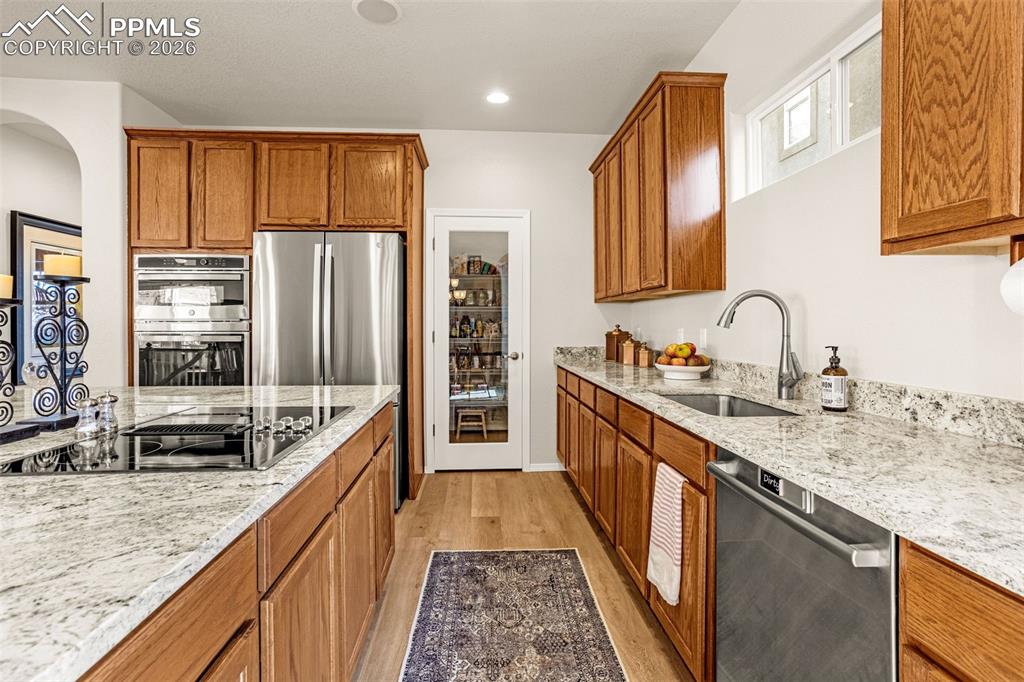 Image 10 of 42: New LVP flooring, new paint, new stainless steel appliances, new granite co