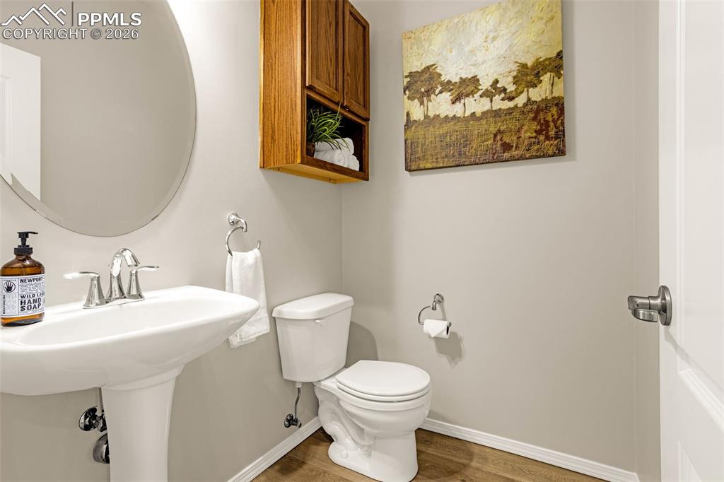 Image 14 of 42: Guest powder room