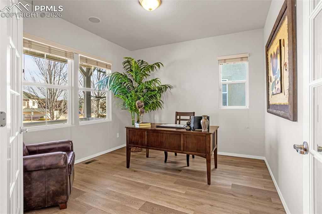 Image 5 of 42: Spacious office with new LVP flooring