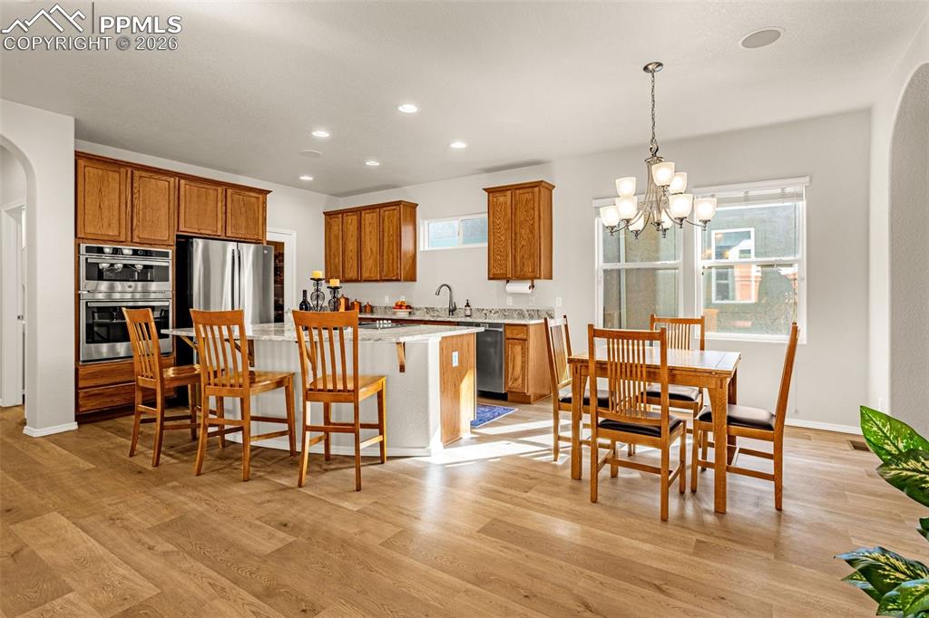 Image 7 of 42: New LVP flooring, new paint, new stainless steel appliances, new granite co