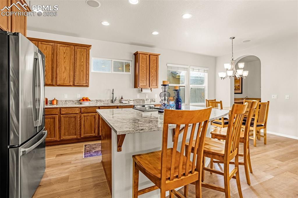 Image 8 of 42: New LVP flooring, new paint, new stainless steel appliances, new granite co