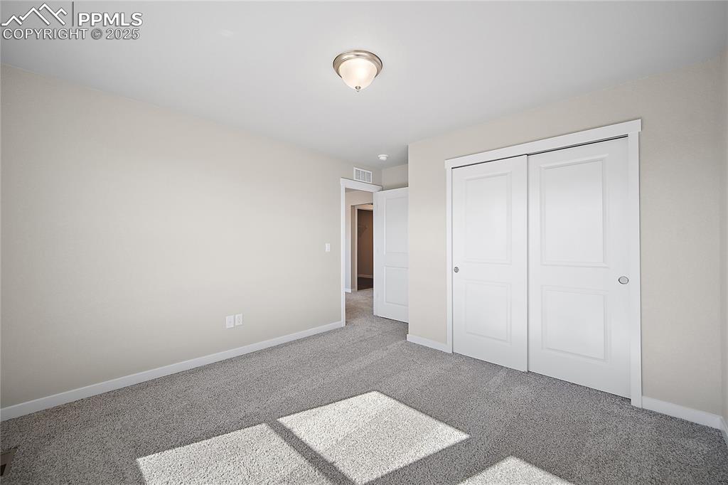 Image 29 of 38: Bedroom