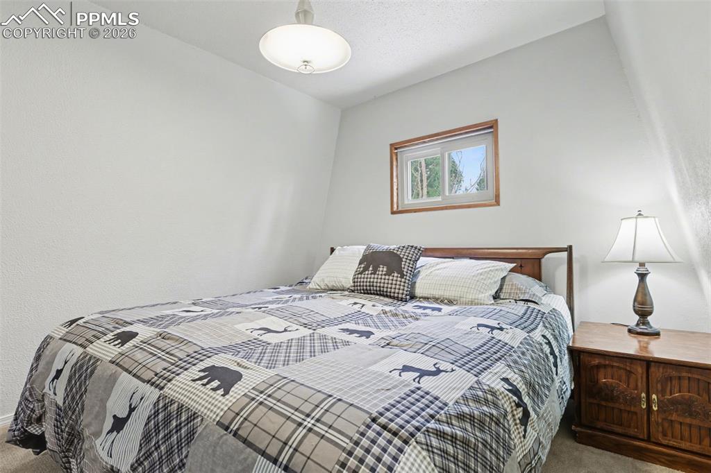 Image 20 of 29: Upstairs Bedroom with King Bed