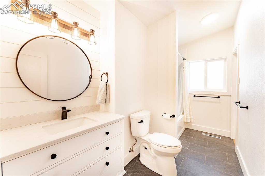 Image 13 of 39: Upstairs Bathroom