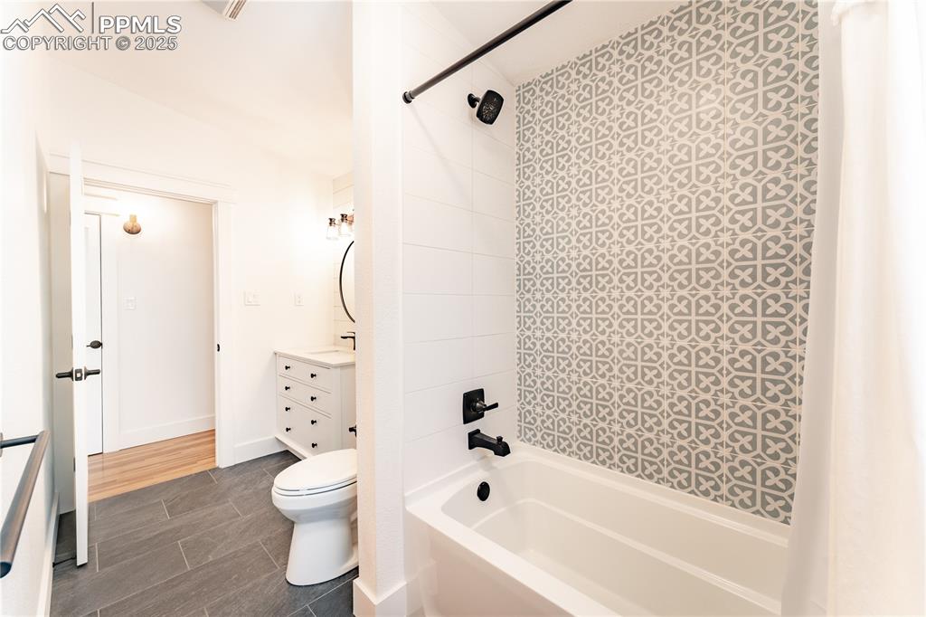 Image 14 of 39: Upstairs Bathroom