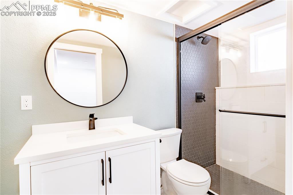 Image 19 of 39: Lower Level Bathroom