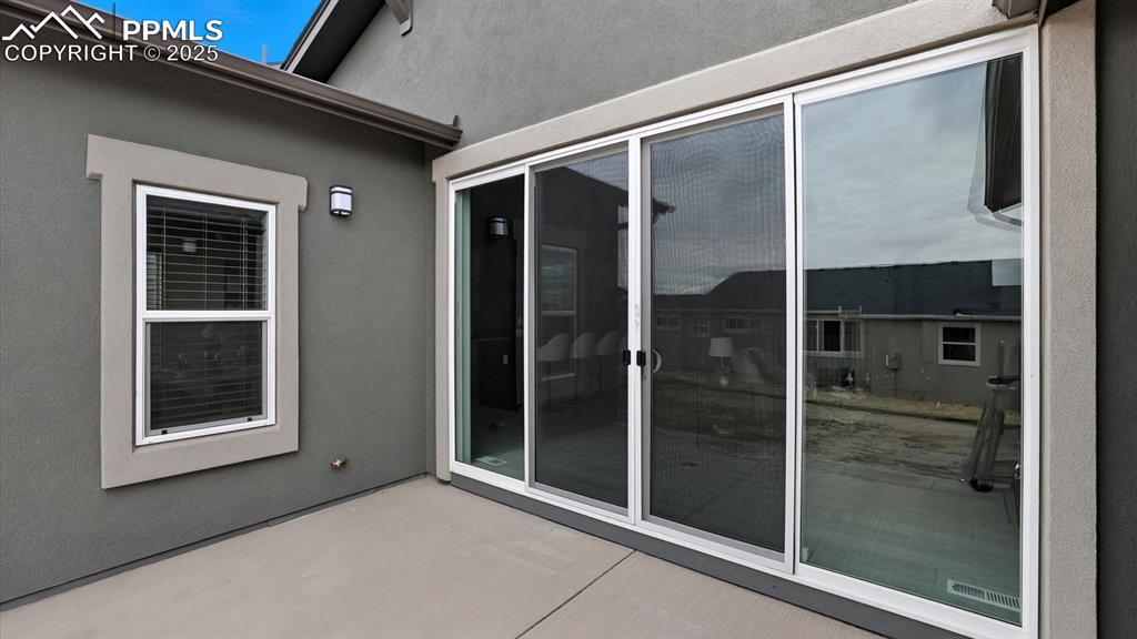 Image 10 of 50: Backyard patio with gas stub for future grill.