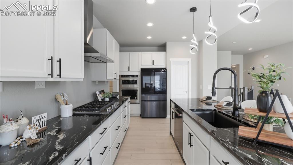 Image 16 of 50: Gorgeous marble look quartz countertops.