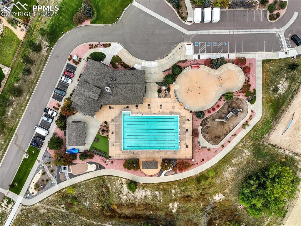 Image 49 of 50: Wolf Ranch overhead view of pool and clubhouse