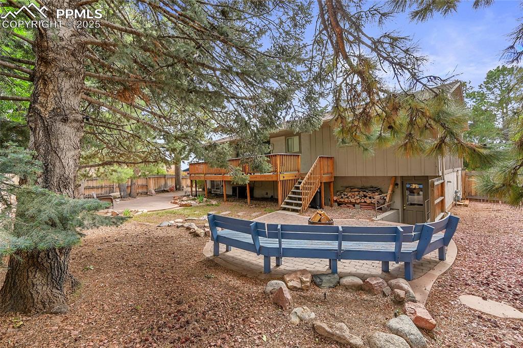 Image 33 of 45: Space for camper parking on side yard with large gated access