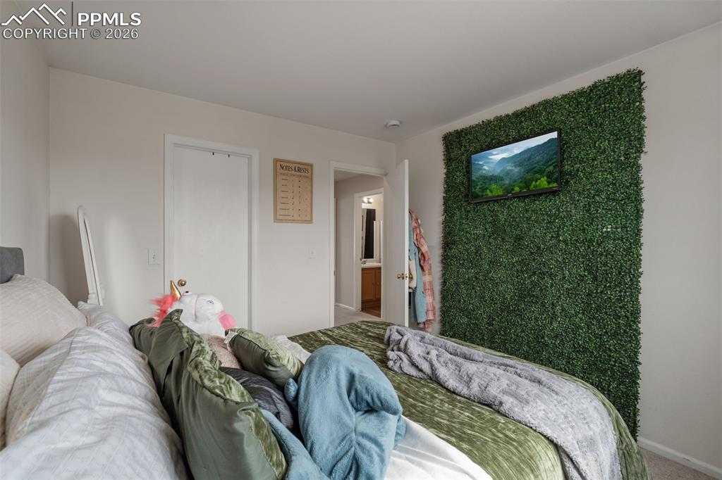 Image 21 of 28: Bedroom