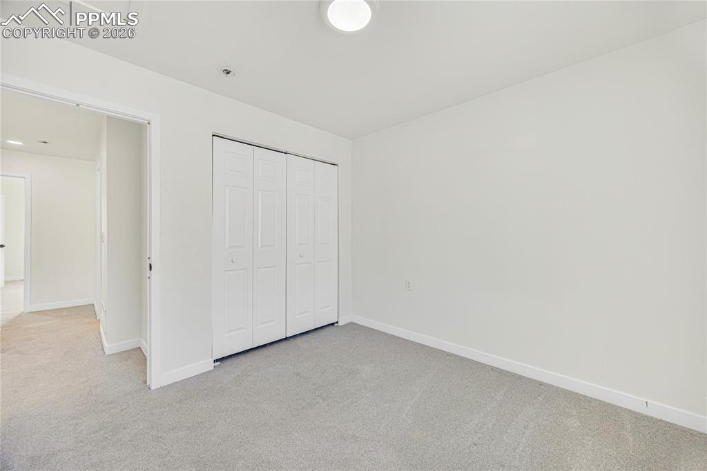 Image 21 of 34: Bedroom