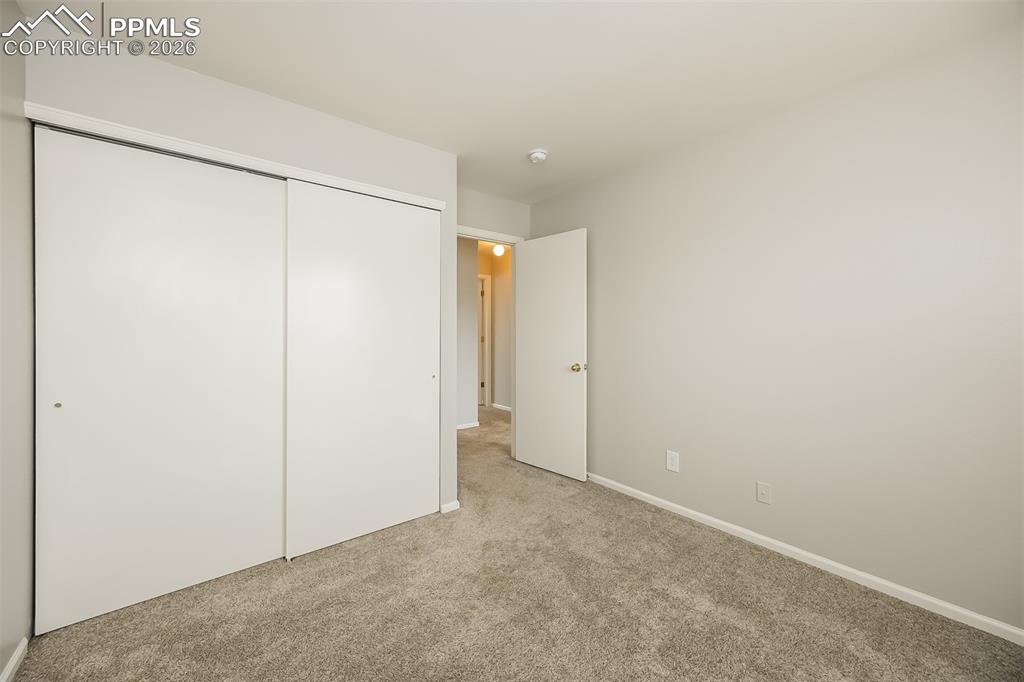 Image 13 of 23: Bedroom